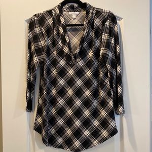 Black and white plaid patterned blouse